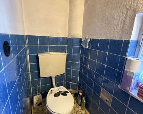 Toilette im Zwischengeschoss