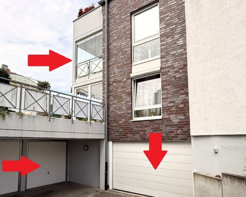 3 Seitenansicht mit Garage und Tiefgarageneinfahrt 
